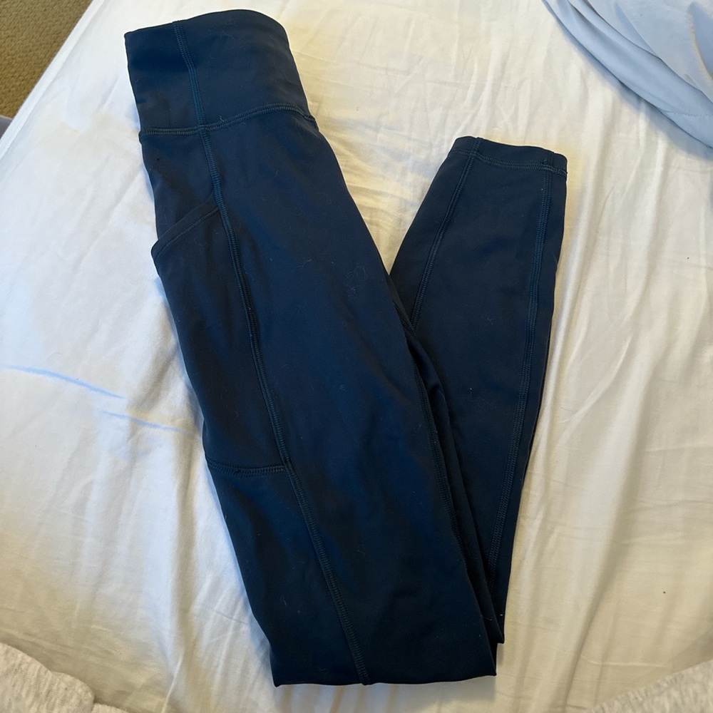 Teal capri lululemon leggings with pockets on the side